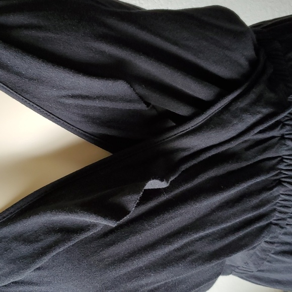 Like new, Romper black with ruffle and trim so cute split up the sides of short - Picture 3 of 7